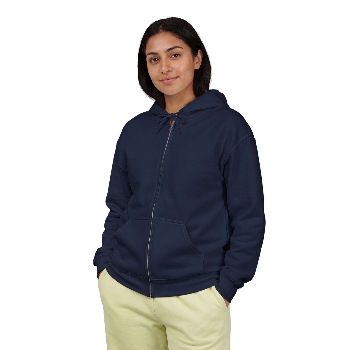 A woman wearing a navy blue zip-up hoodie with a drawstring hood and kangaroo pockets, paired with light yellow sweatpants, photographed against a solid white background. Shop online Comfortable Chill Vibes Clear Mind Zip Hoodie Casual Wear for soft, everyday comfort, relaxed style, and an effortlessly calm look. Elevate your off-duty wardrobe with the Comfortable Chill Vibes Clear Mind Zip Hoodie—made for warmth, ease, and relaxed moments. Buy the Comfortable Chill Vibes Clear Mind Zip Hoodie.