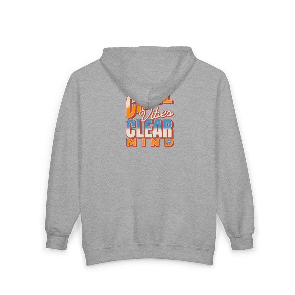 A light gray pullover hoodie shown from the back, featuring a colorful graphic print on the upper back with the text 'GIRL VIBES CLEAR MIND' in orange, blue, and white. Shop online Comfortable Chill Vibes Clear Mind Zip Hoodie Casual Wear for soft, everyday comfort, relaxed style, and an effortlessly calm look. Elevate your off-duty wardrobe with the Comfortable Chill Vibes Clear Mind Zip Hoodie—made for warmth, ease, and relaxed moments. Buy the Comfortable Chill Vibes Clear Mind Zip Hoodie.
