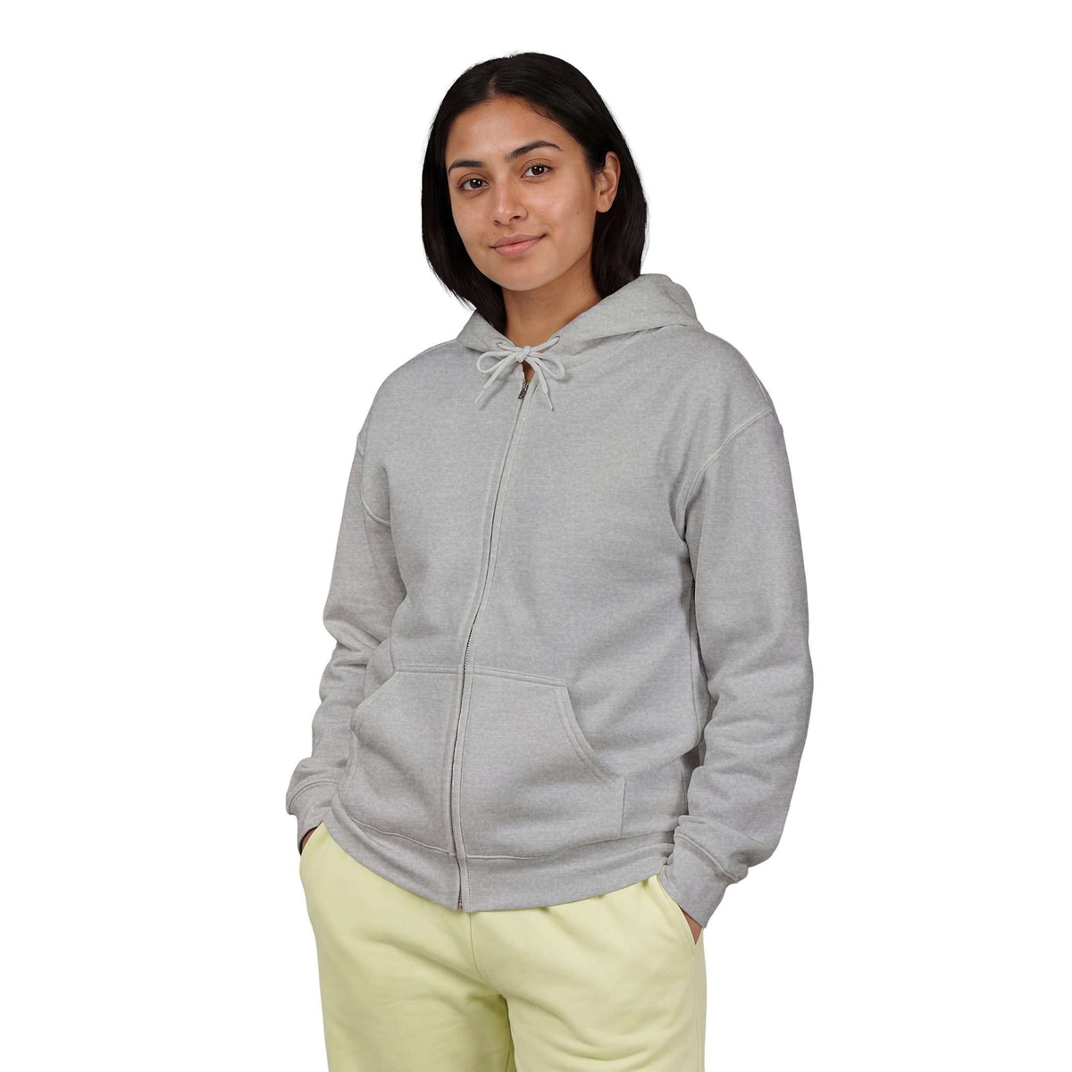 A woman wearing a light gray zip-up hoodie with 'Jesus is Lord' embroidered on the chest, paired with pale yellow sweatpants, set against a plain white background. Shop online Comfortable Chill Vibes Clear Mind Zip Hoodie Casual Wear for soft, everyday comfort, relaxed style, and an effortlessly calm look. Elevate your off-duty wardrobe with the Comfortable Chill Vibes Clear Mind Zip Hoodie—made for warmth, ease, and relaxed moments. Buy the Comfortable Chill Vibes Clear Mind Zip Hoodie, designed for cozy.